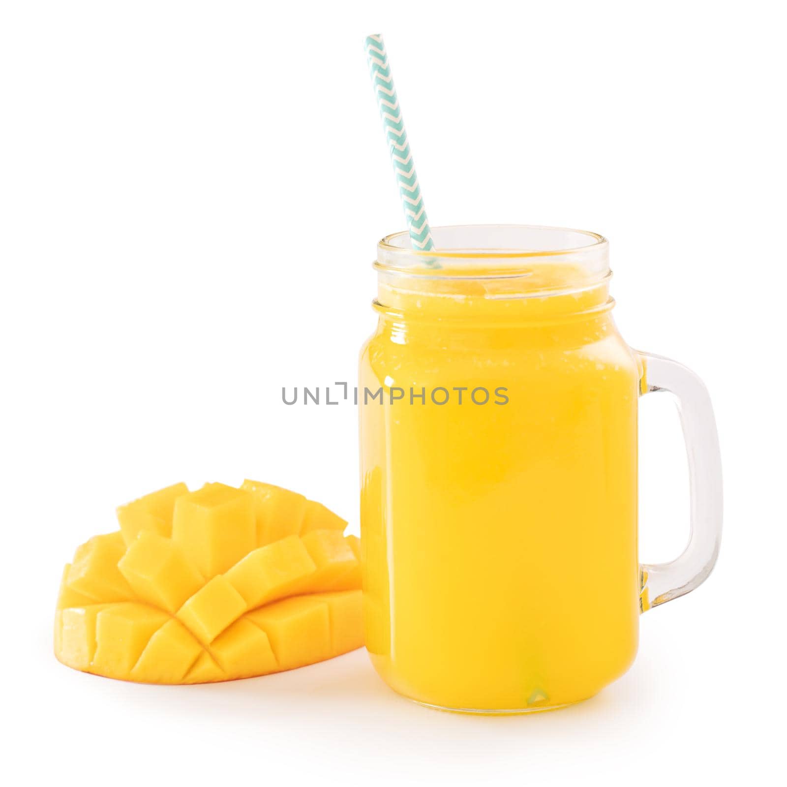 Fresh tropical mango juice with beautiful diced fruit flesh, striped paper straw isolated on white background table, close up, cut out, clipping path.