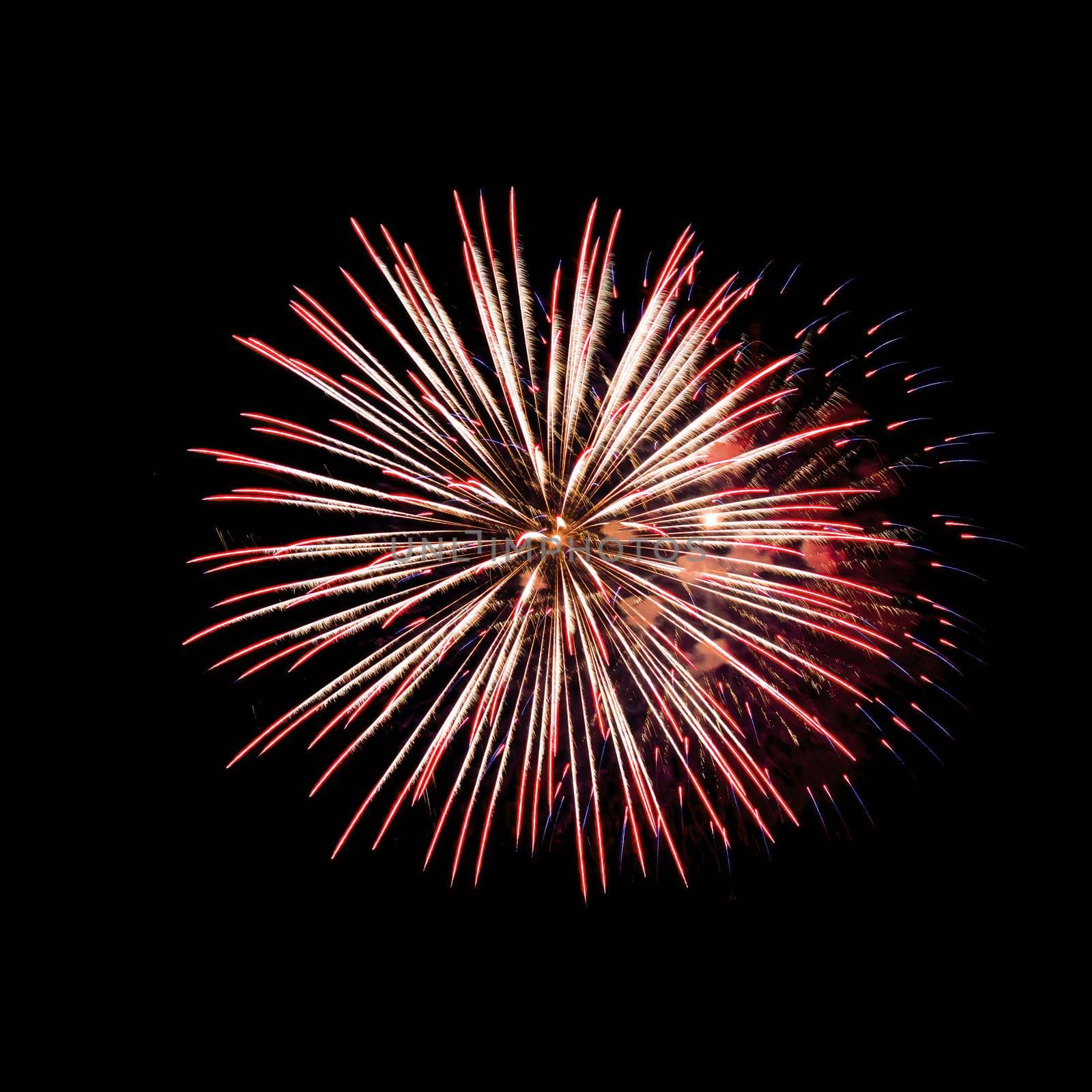 Colorful fireworks isolated on black sky background.