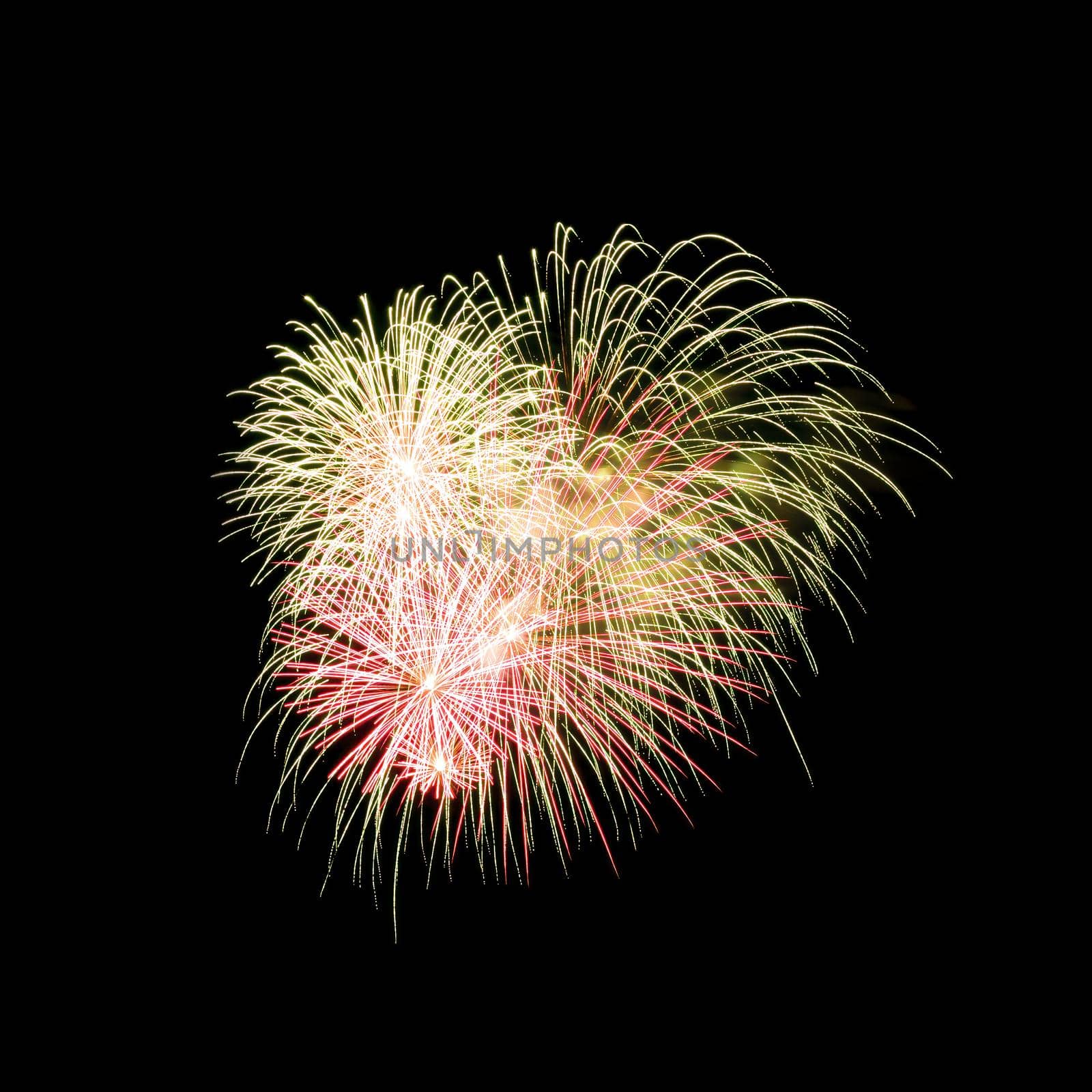 Colorful fireworks isolated on black sky background.