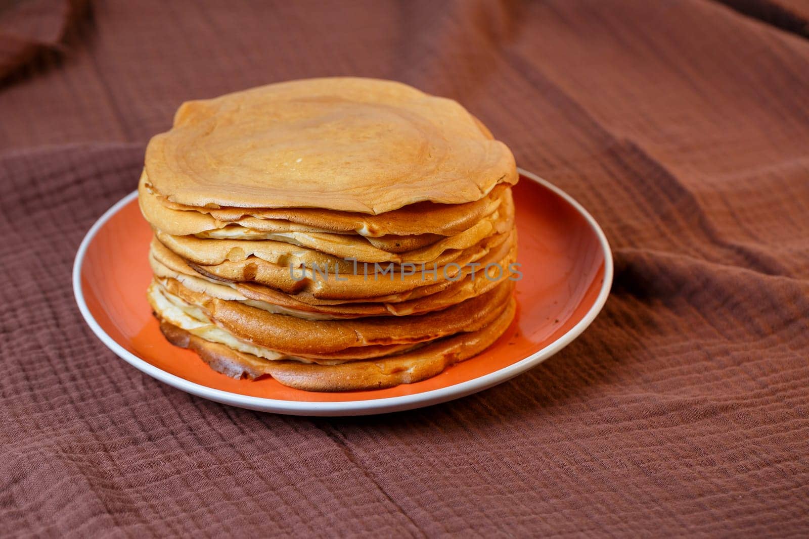 Delicious homemade fried pancakes with natural ingredients, plate with homemade pancakes