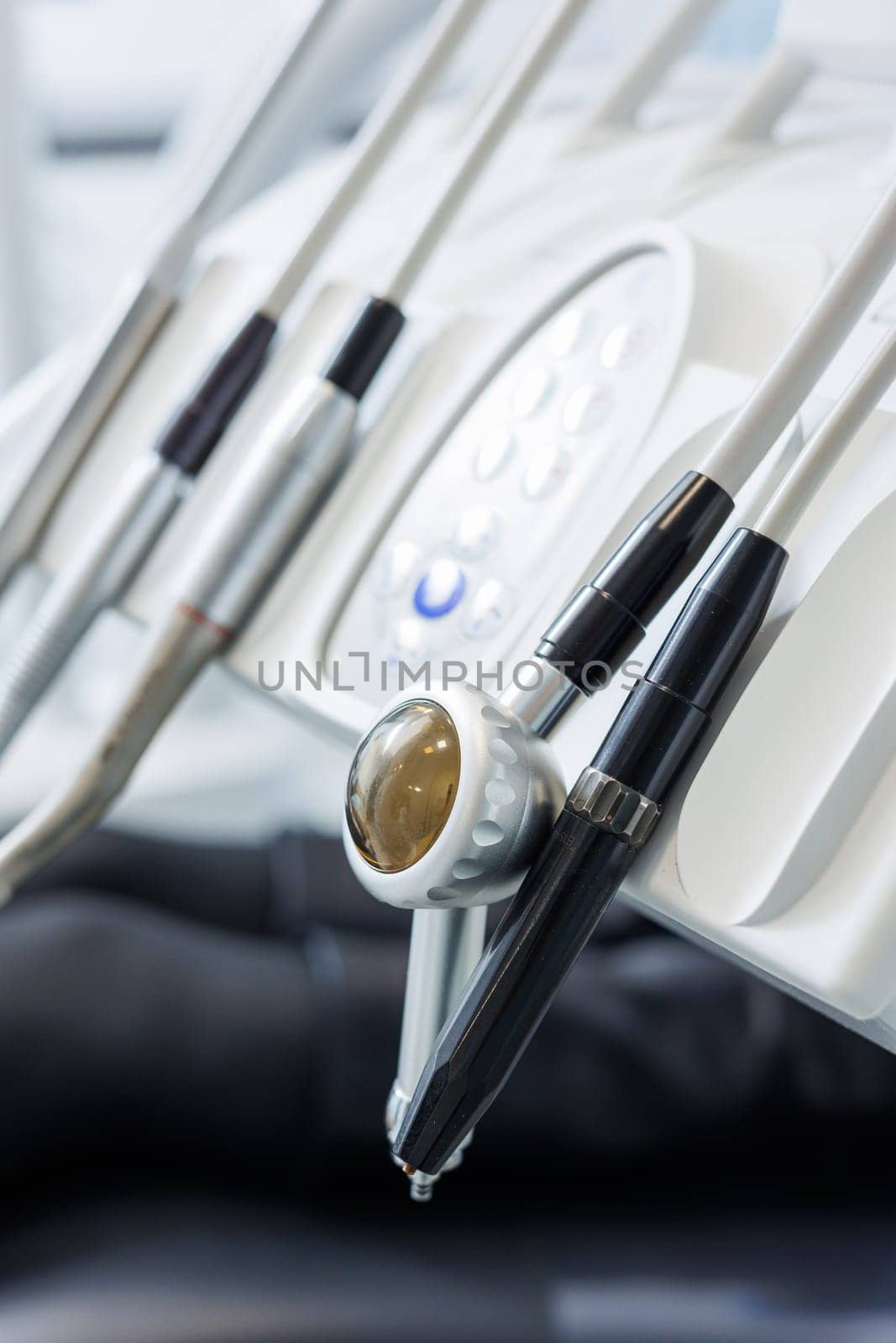 Close-up of dental chair tools. Dental Office