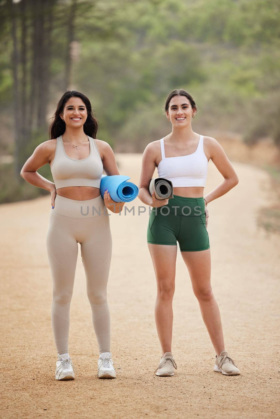 Fitness, portrait or women friends in nature for yoga exercise to start workout or body training. Healthy athlete smile, relaxed girls or happy people ready for outdoor exercising together on mat by YuriArcurs