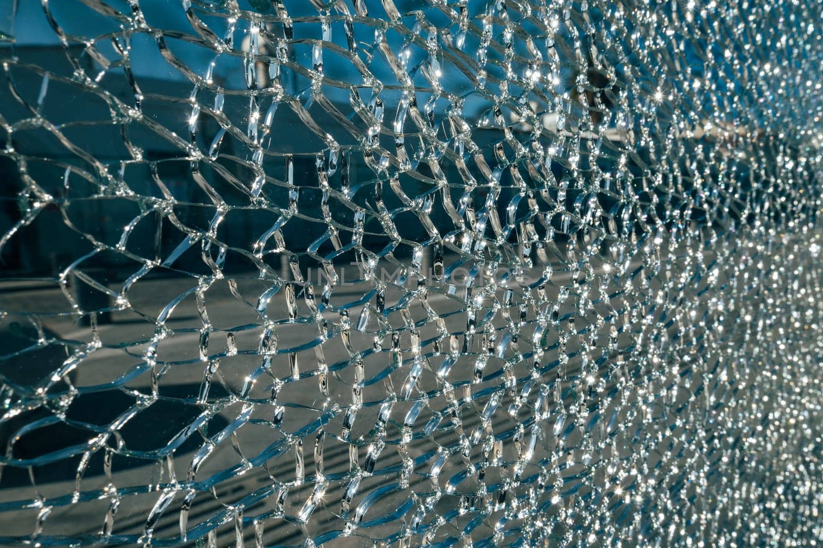 Shattered glass and spider web create unique broken background patterns.