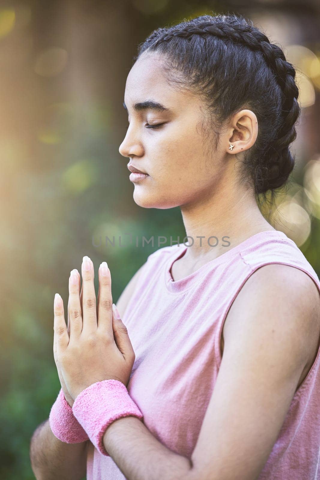 Yoga, meditation and zen with a black woman athlete training outdoor for mental health or wellness. Relax, meditate and spiritual with a young female yogi finding peace or inner balance outside.