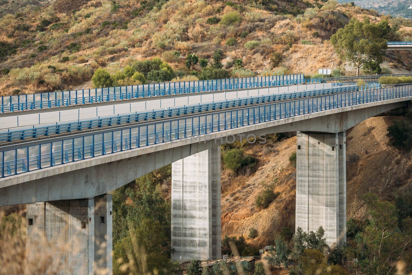 Modern highway bridge with striking architecture and sturdy supporting columns for efficient transportation.