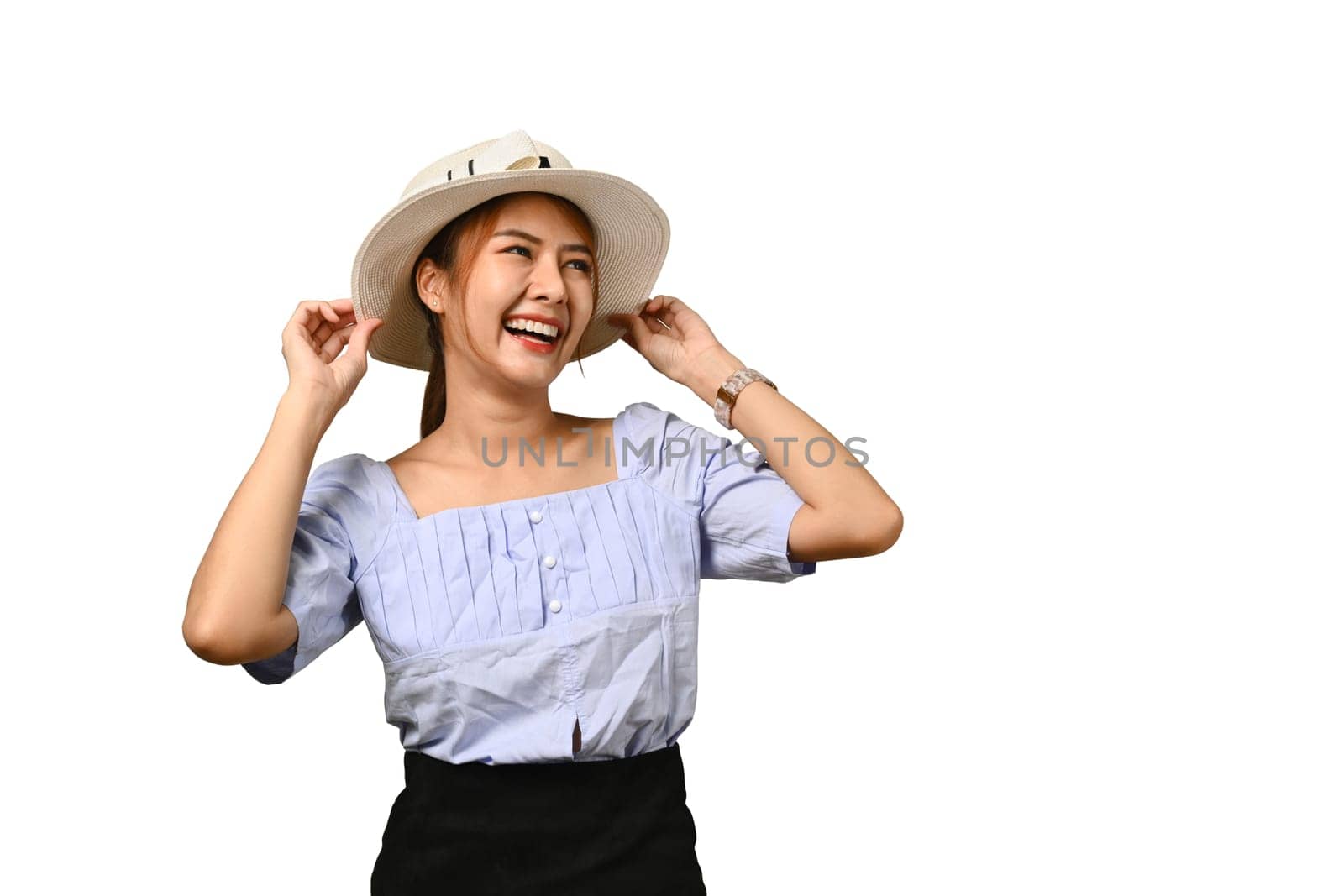 Portrait of smiling young woman in summer hat and casual clothes isolated on white background. Holiday, vacation, traveling concept by prathanchorruangsak