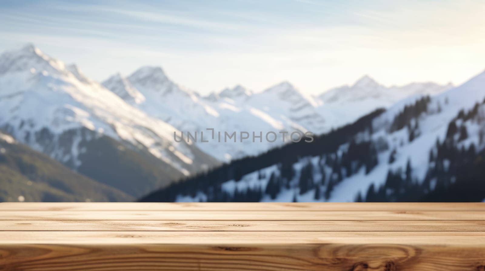 The empty wooden table top with blur background of Alpine with snow capped. Exuberant image.