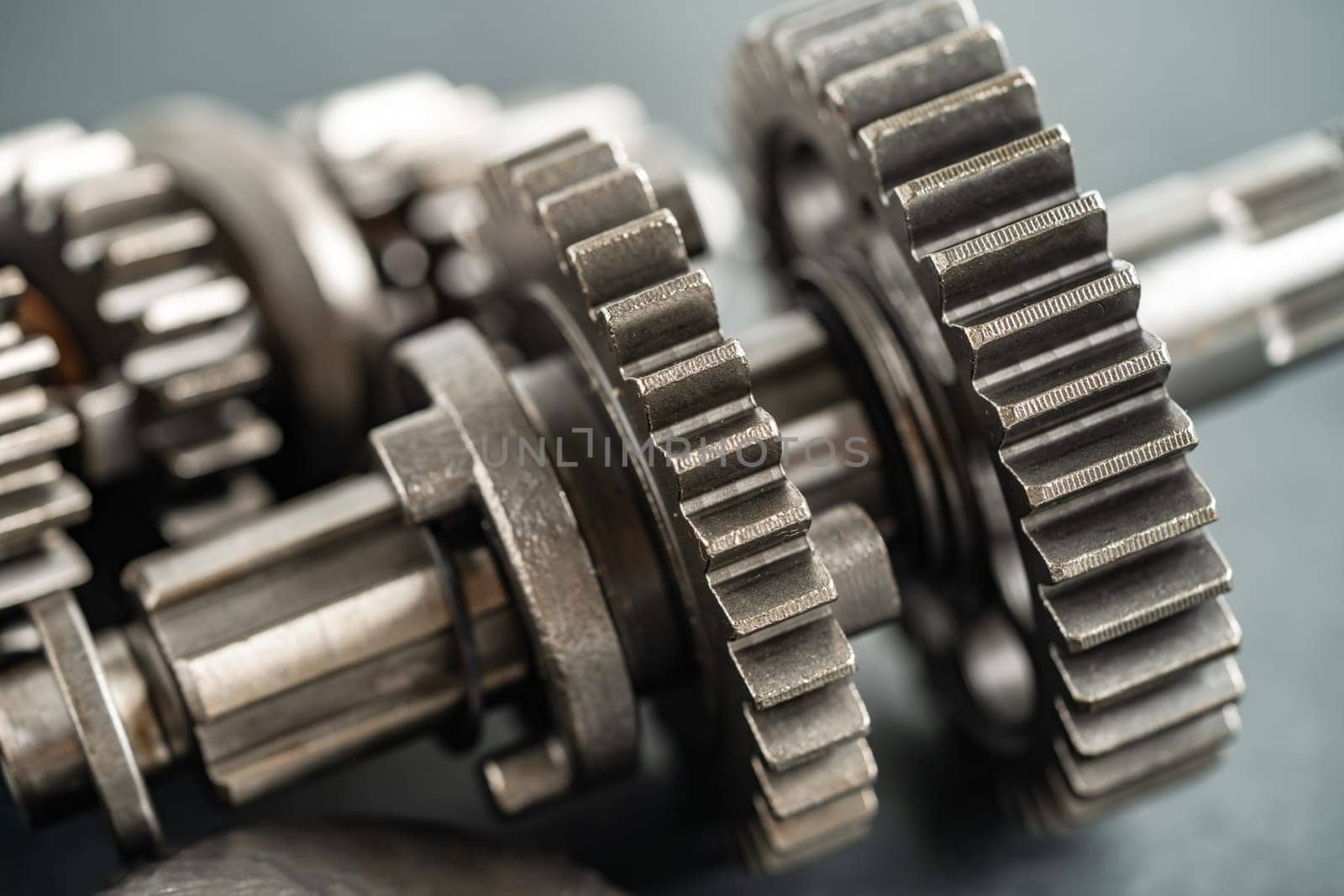 Gear and cogs wheels, clock mechanism, brass metal engine industrial.