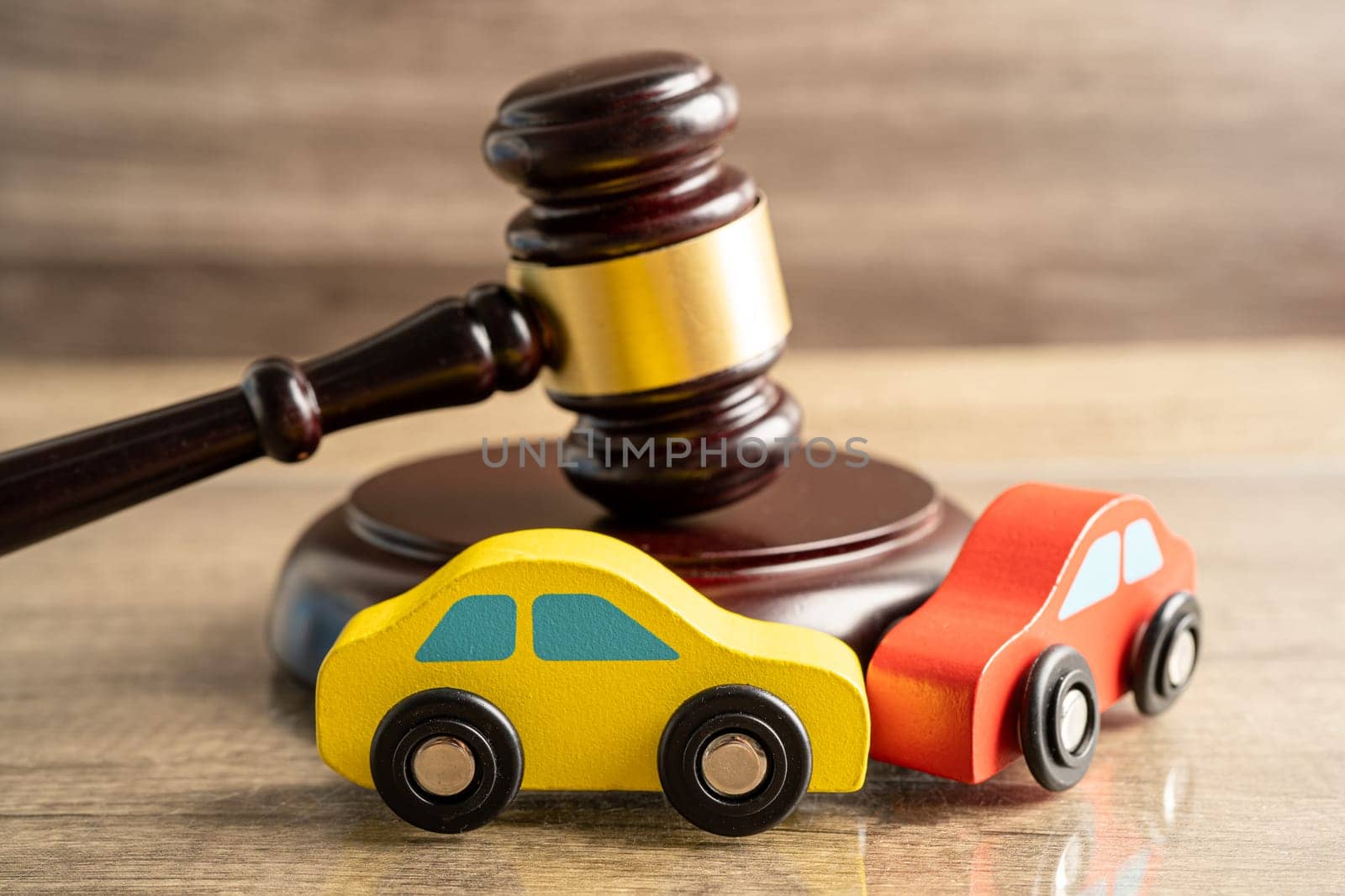 Hammer gavel judge with car vehicle accident, insurance coverage claim lawsuit court case. by pamai