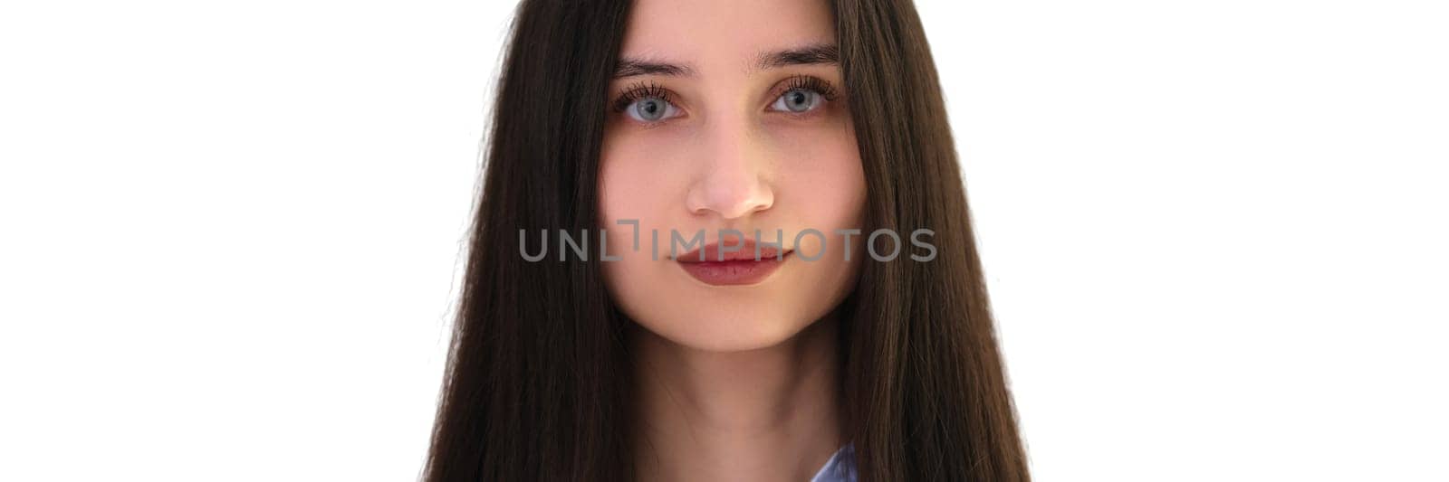 Young woman with dark long hair and blue eyes portrait on white background by kuprevich