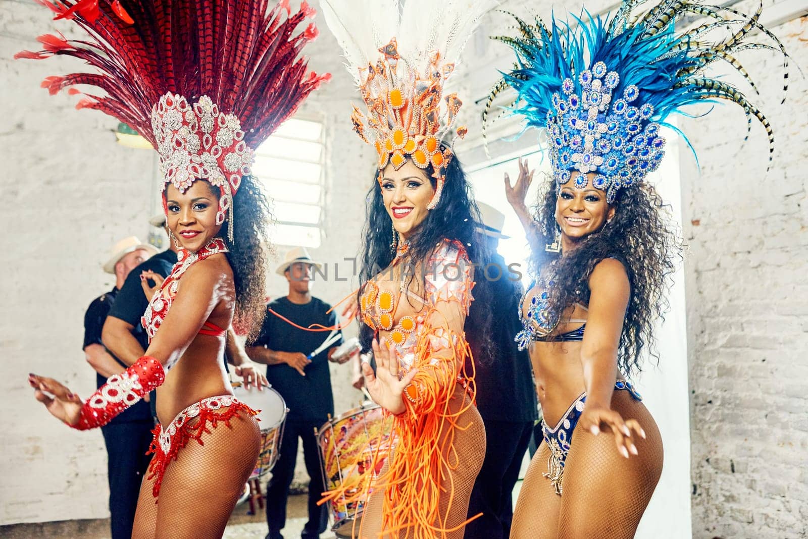 Samba, music and dance with women at carnival for celebration, party and festival in Rio de Janeiro. Summer break, show and creative with brazil girl group for performance, new year and culture by YuriArcurs
