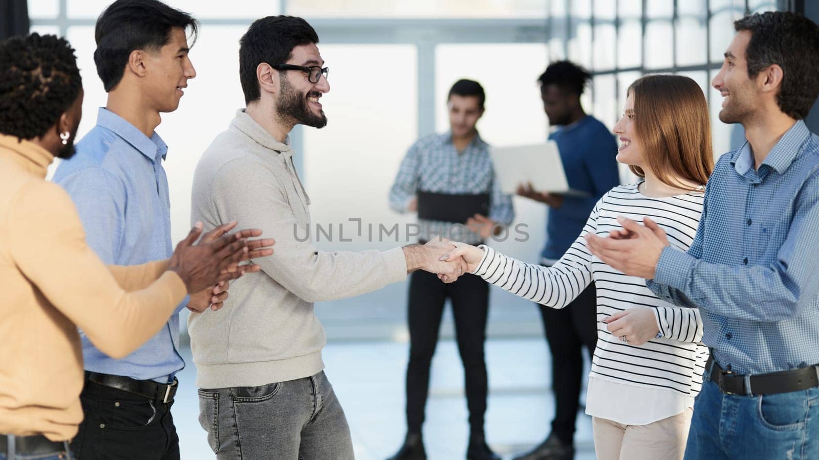 Business people stand and work in an office building