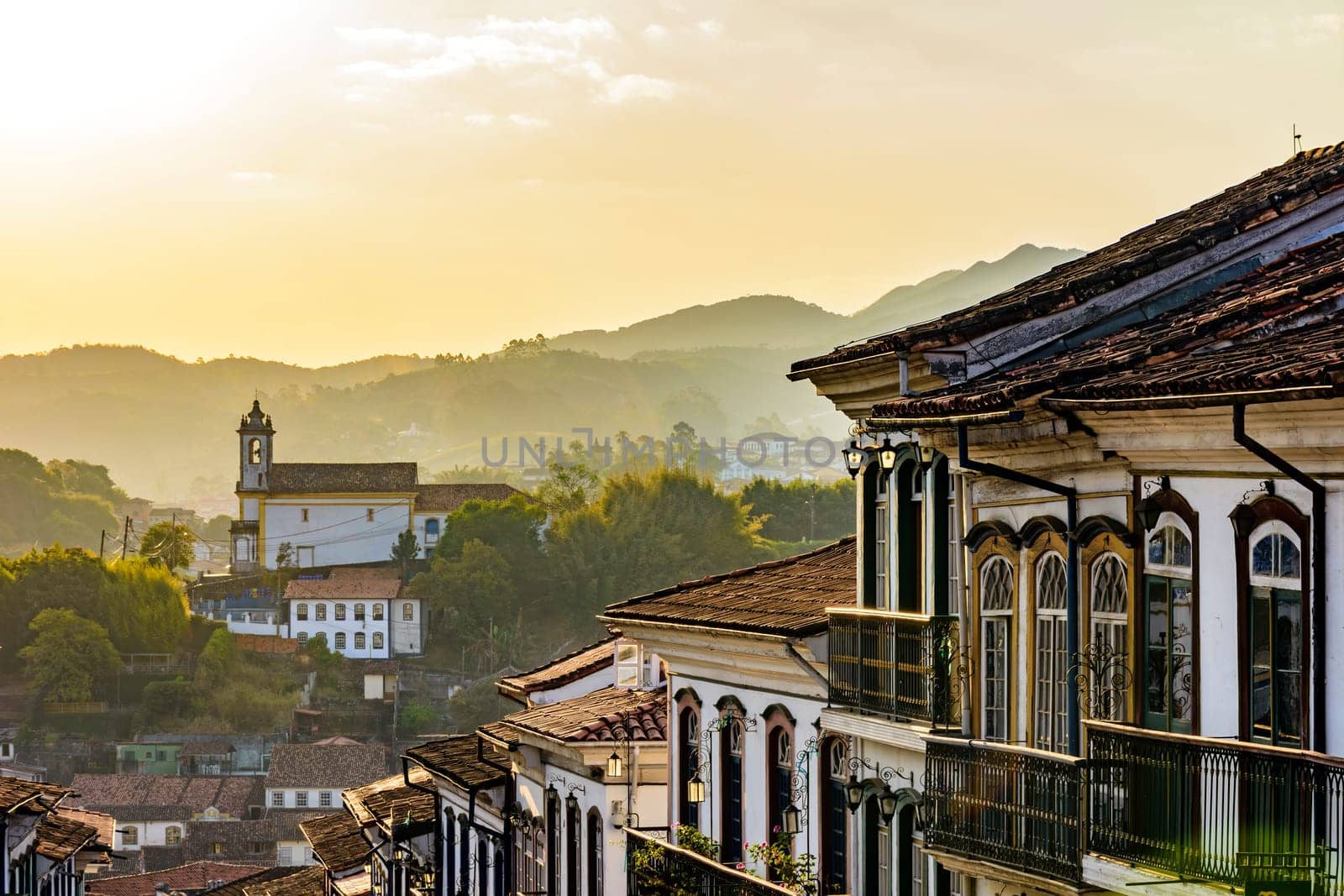 Famous historical city of Ouro Preto in Minas Gerais with its old buildings in baroque, colonial style during sunset