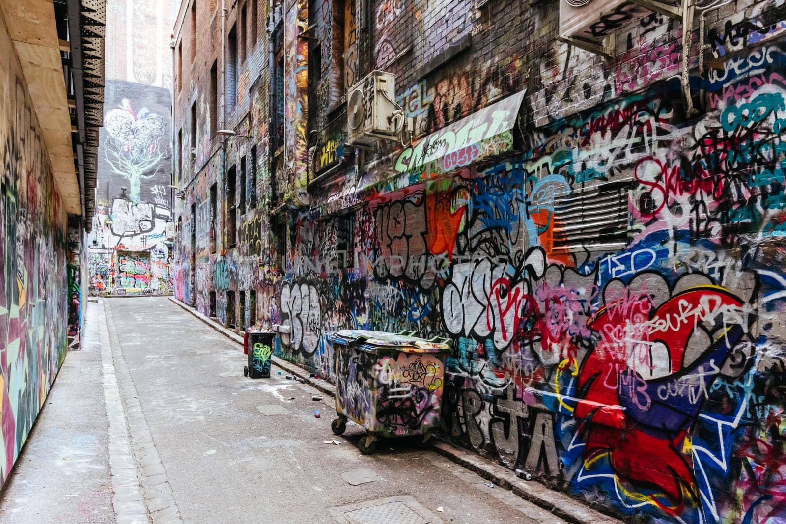 MELBOURNE, AUSTRALIA - June 25 2023: Melbourne's famous Hosier Lane featuring graffiti artwork and grunge urban feel