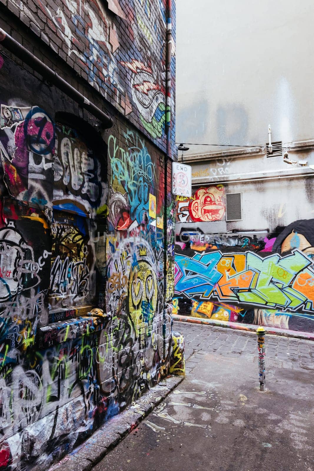 MELBOURNE, AUSTRALIA - June 25 2023: Melbourne's famous Hosier Lane featuring graffiti artwork and grunge urban feel