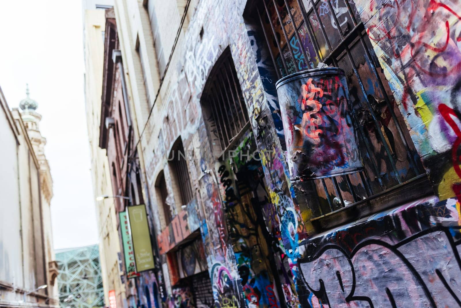 MELBOURNE, AUSTRALIA - June 25 2023: Melbourne's famous Hosier Lane featuring graffiti artwork and grunge urban feel