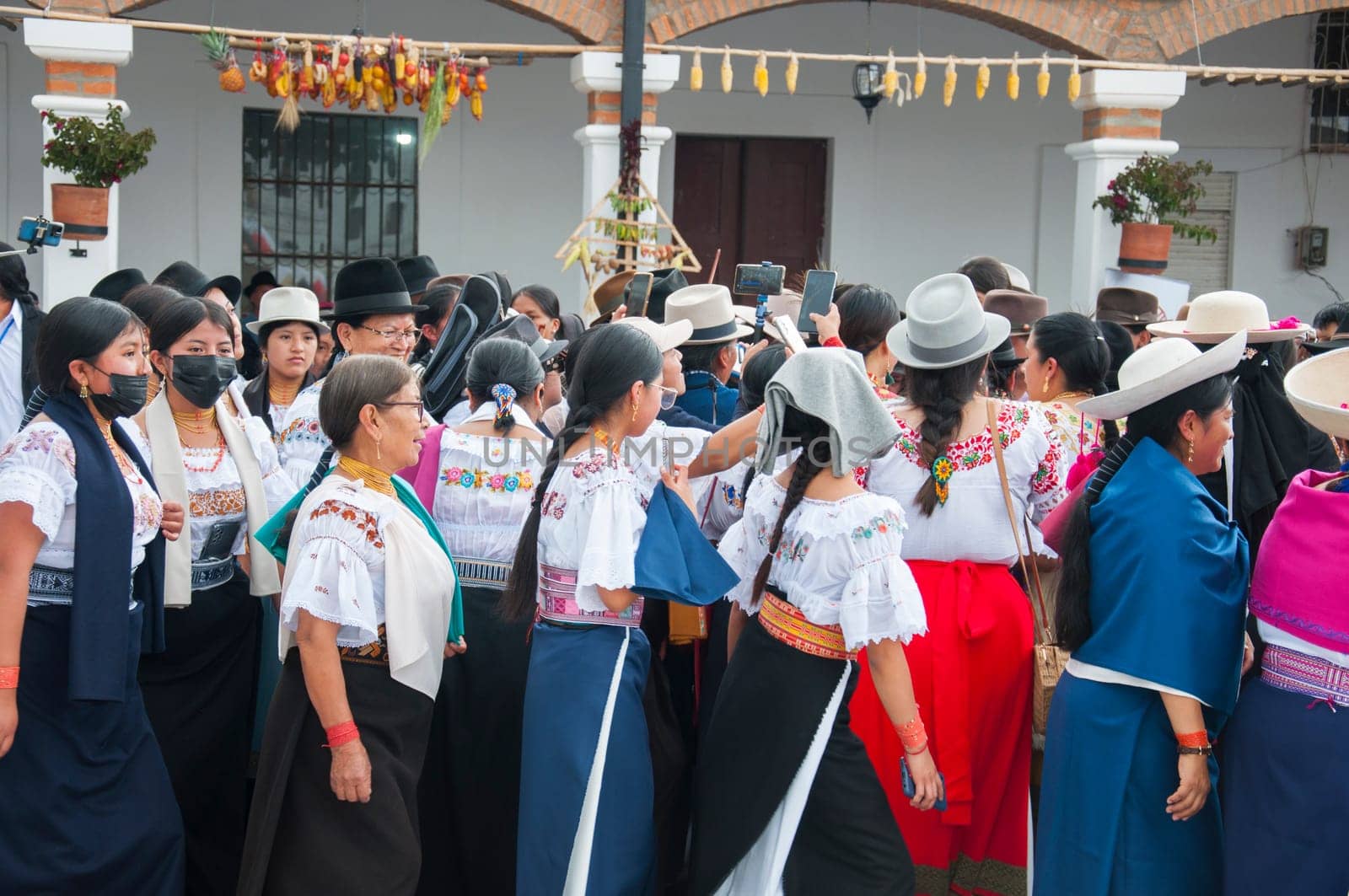 Otavalo, Ecuador - 24 de junio de 2023: Otavalo women dancing in a circle with traditional dresses in inti raymi. High quality photo