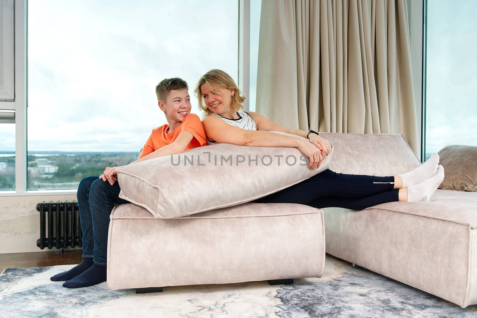 Family rearranging furniture Happy couple moving furniture in new apartment. Moving day happy buyers by PhotoTime