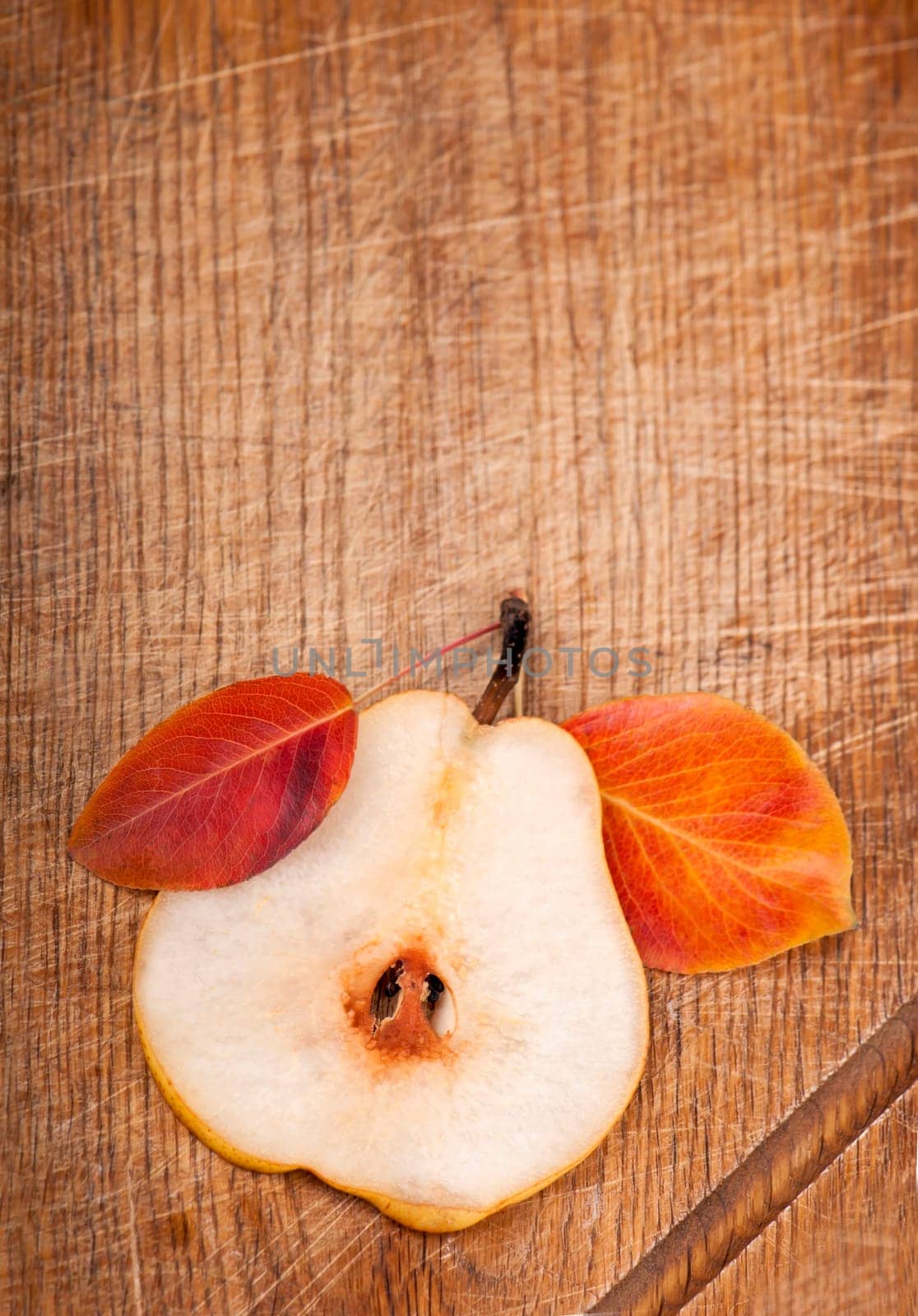 Fresh ripe organic pears on rustic wooden table by aprilphoto