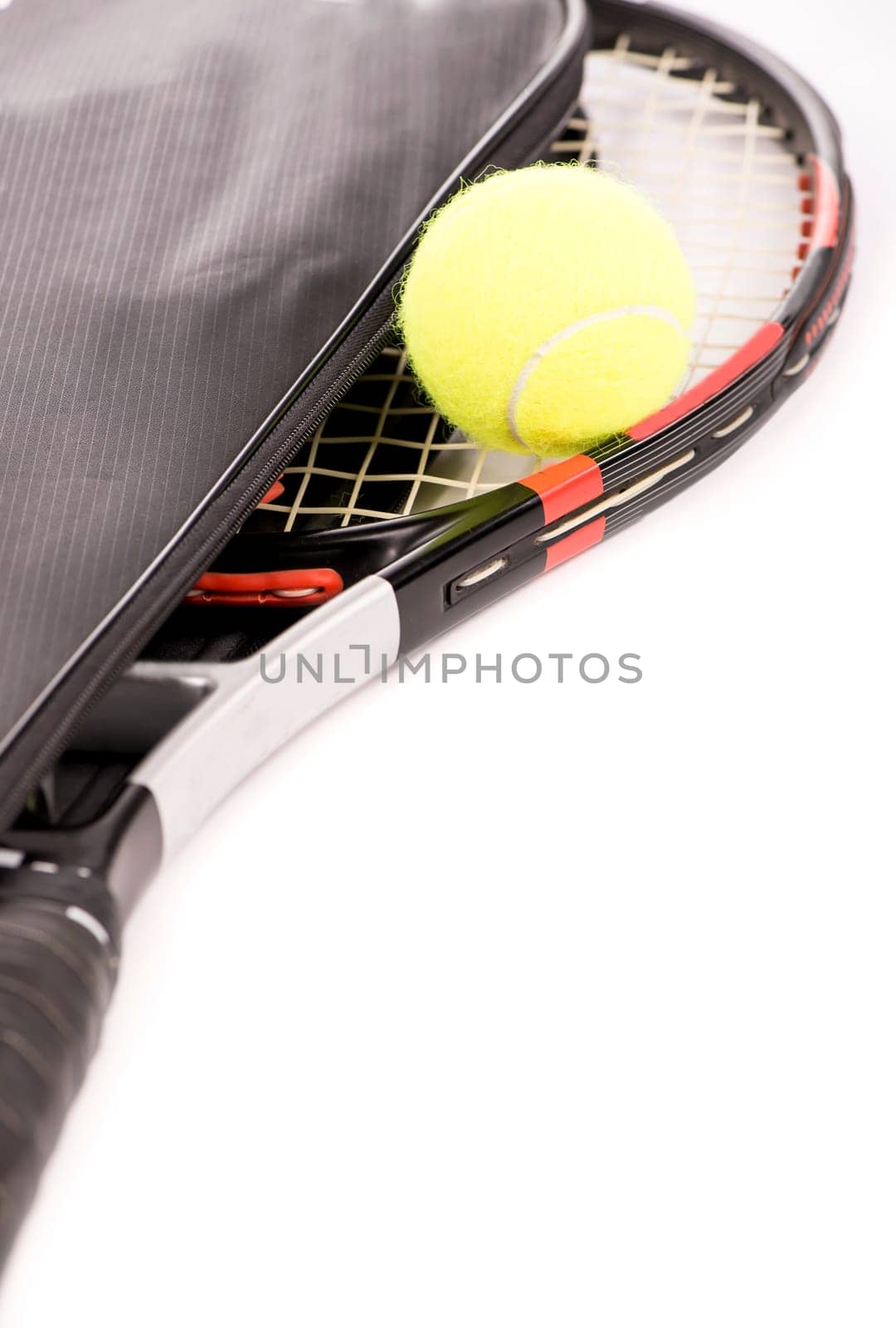 tennis racquet in a case and ball on a white background by aprilphoto