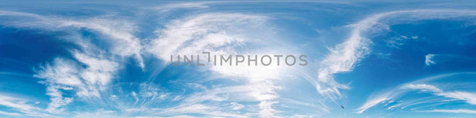 Bright sunset sky panorama with Cirrus clouds. Seamless hdr spherical equirectangular 360 panorama. Sky dome or zenith for 3D visualization, game and sky replacement for aerial drone 360 panoramas.