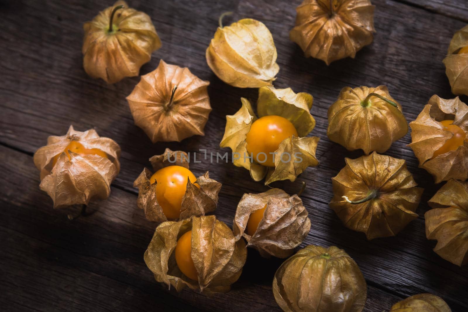 cape gooseberries on wooden background