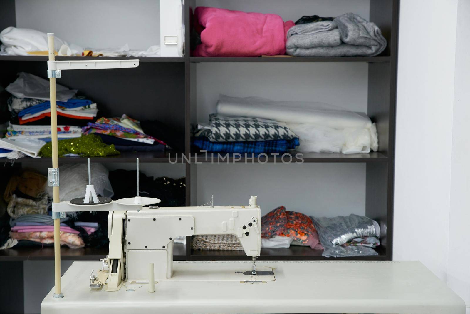 Sewing machine on table in workshop