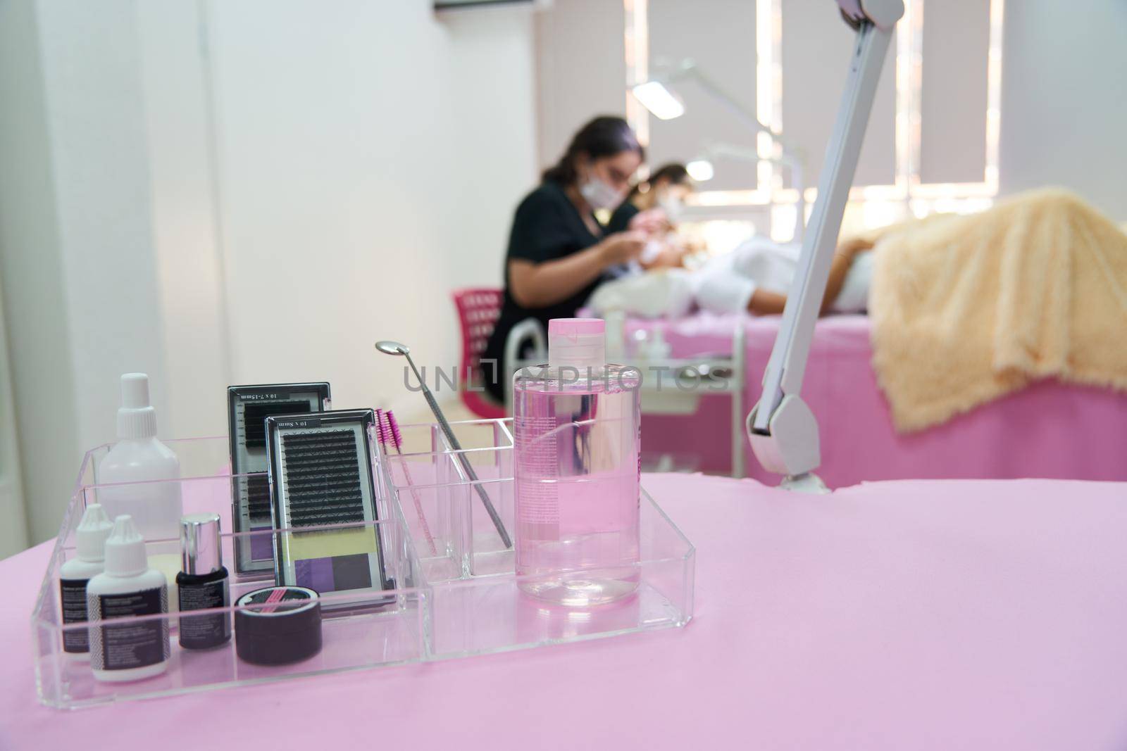 Set of eyelashes tools and cosmetic in beauty salon