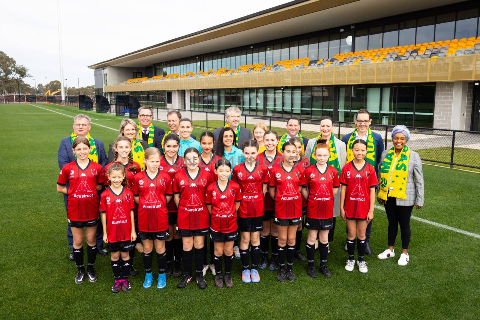 MELBOURNE, AUSTRALIA - JULY 03: Matildas Alex Chidiac, Steph Catley with Sports Minister Steve Dimopoulous and children from Eltham Redbacks FC at the official opening of the Australian Matildas training facility and FIFA 2023 Women's World Cup squad announcement at La Trobe University on July 03, 2023 in Melbourne, Australia.