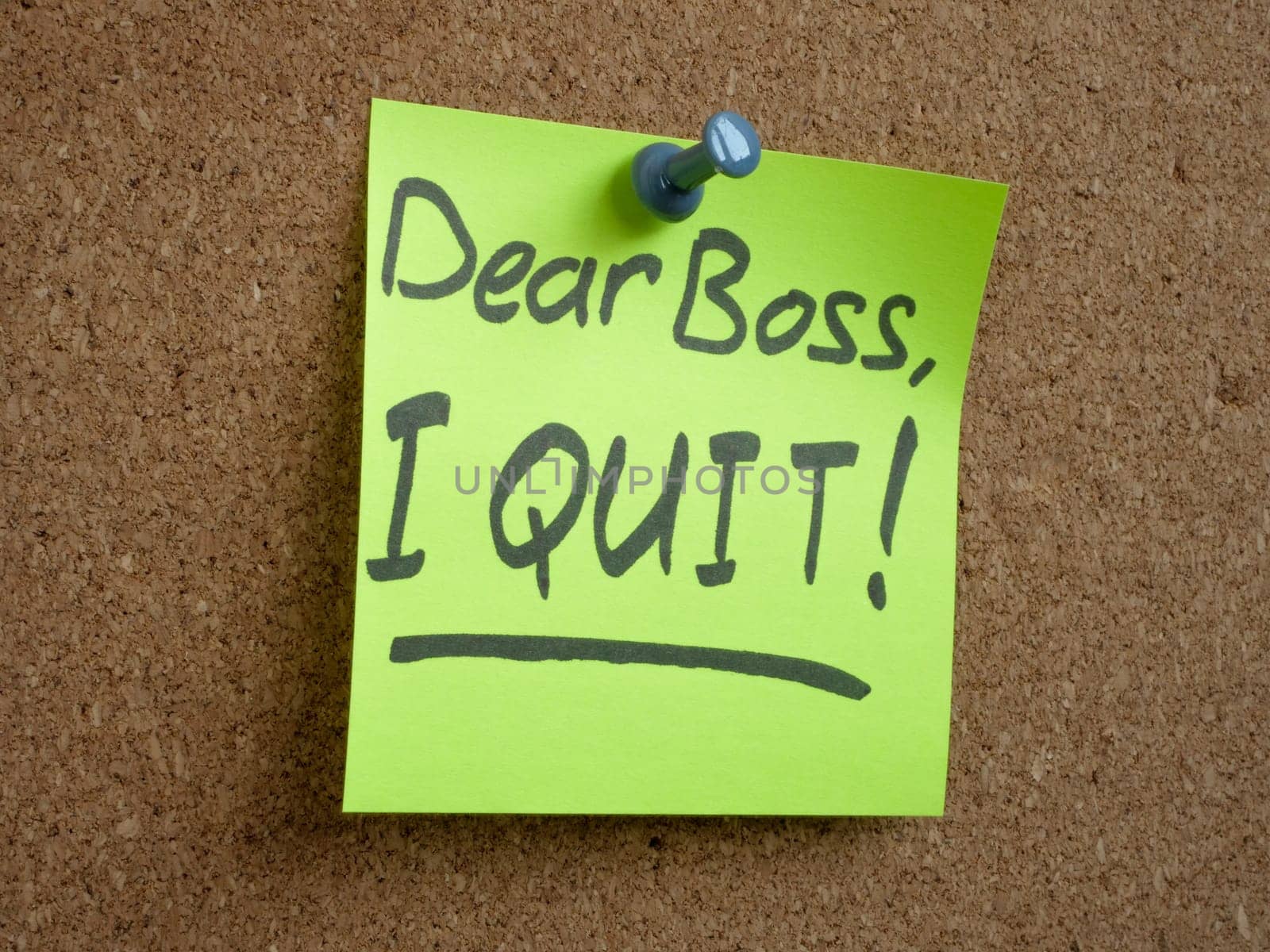 Pinned sticker with the inscription Dear boss, I quit. Employee quits concept. by designer491
