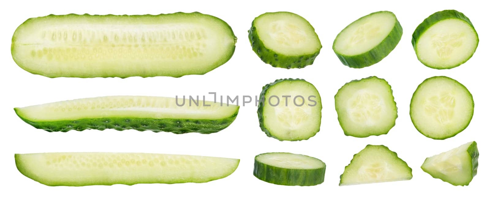 Set slices of green cucumbers on a white isolated background. Cucumber slices hanging or falling on white. The concept of a delicious addition to a salad. High quality photo by SERSOL