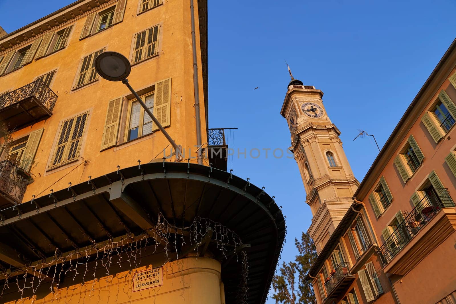 Evening in Nice, France. Low angle view of architecture details by berezko