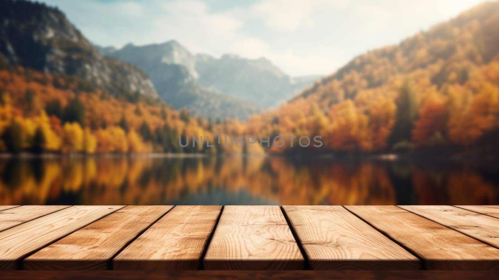 The empty wooden table top with blur background of lake and mountain in autumn. Exuberant image.
