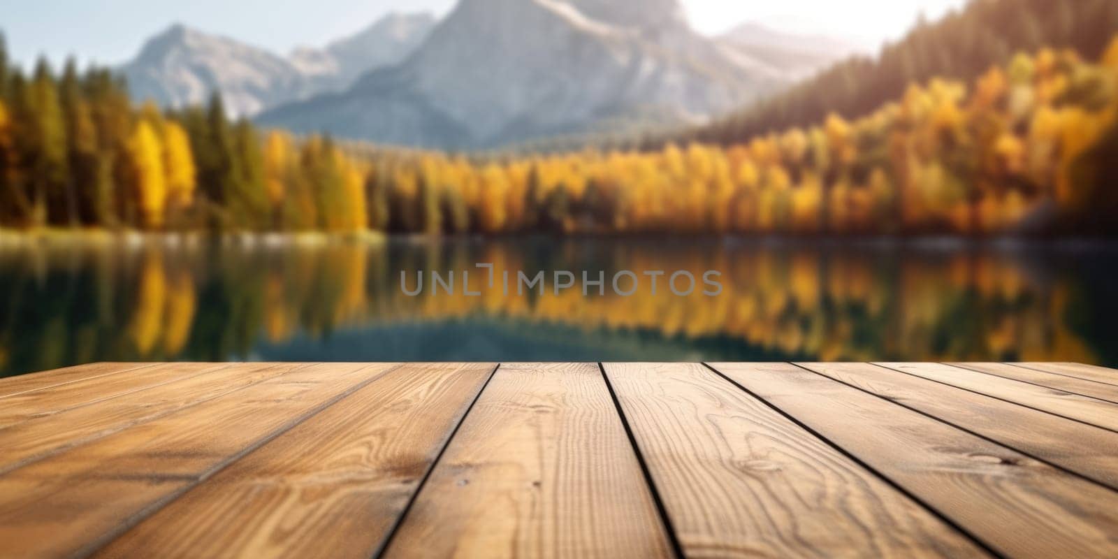 The empty wooden table top with blur background of lake and mountain in autumn. Exuberant. by biancoblue