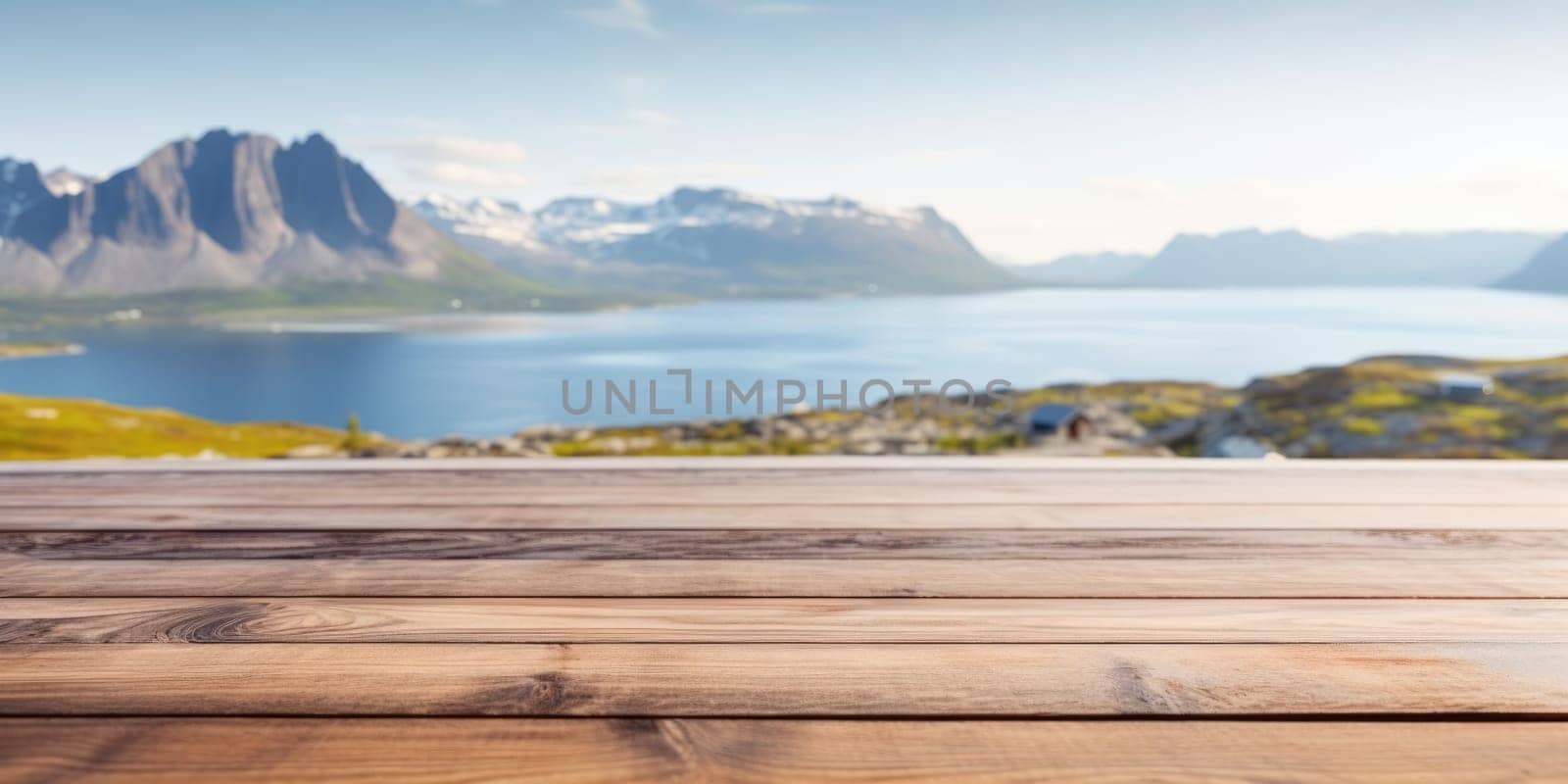 The empty wooden brown table top with blur background of Greenland in summer. Exuberant image.