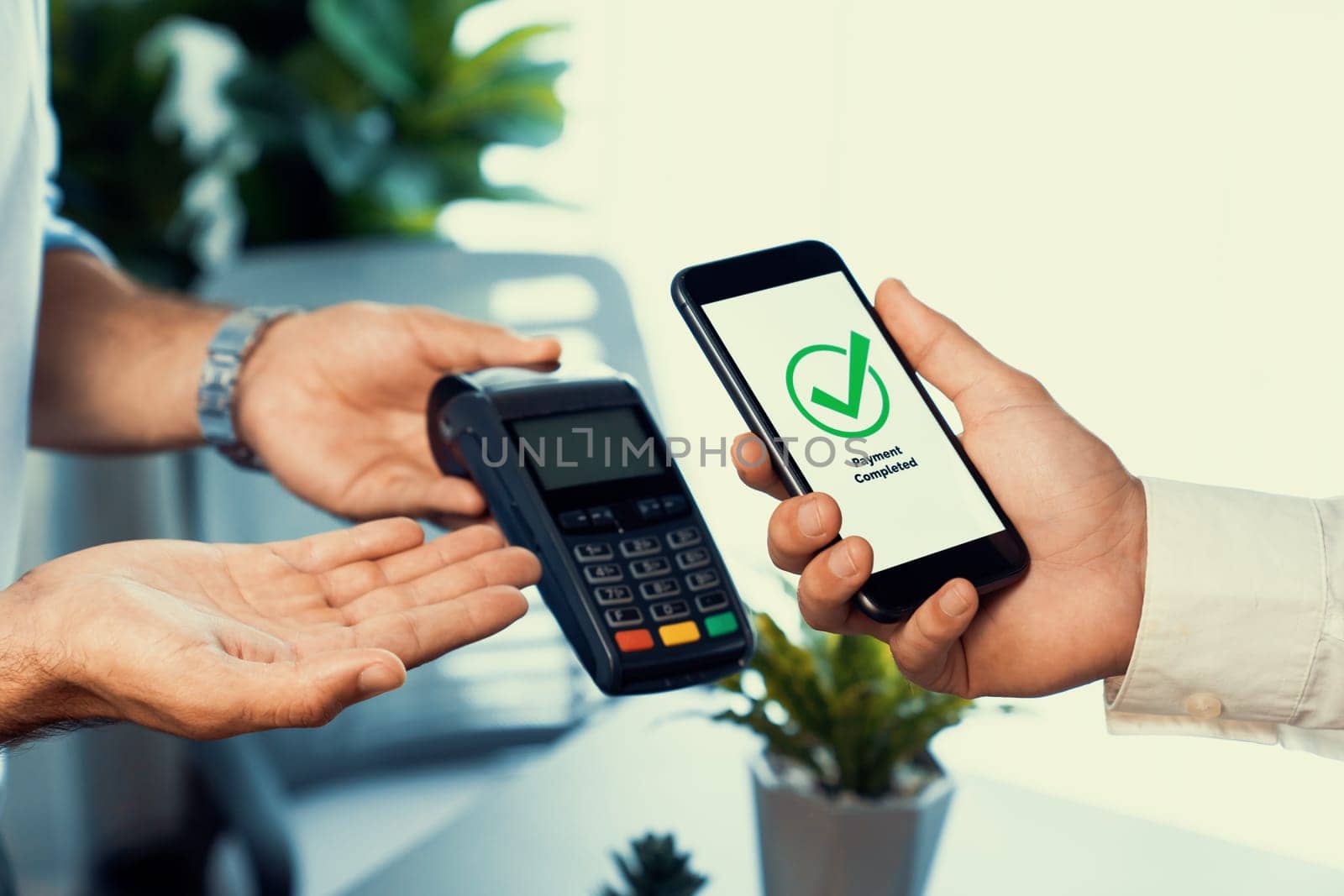 Hand holding smartphone with NFC QR code device, scanning contactless payment code for fast digital transaction. Online banking app on mobile phone for modern lifestyle payment technology. fervent