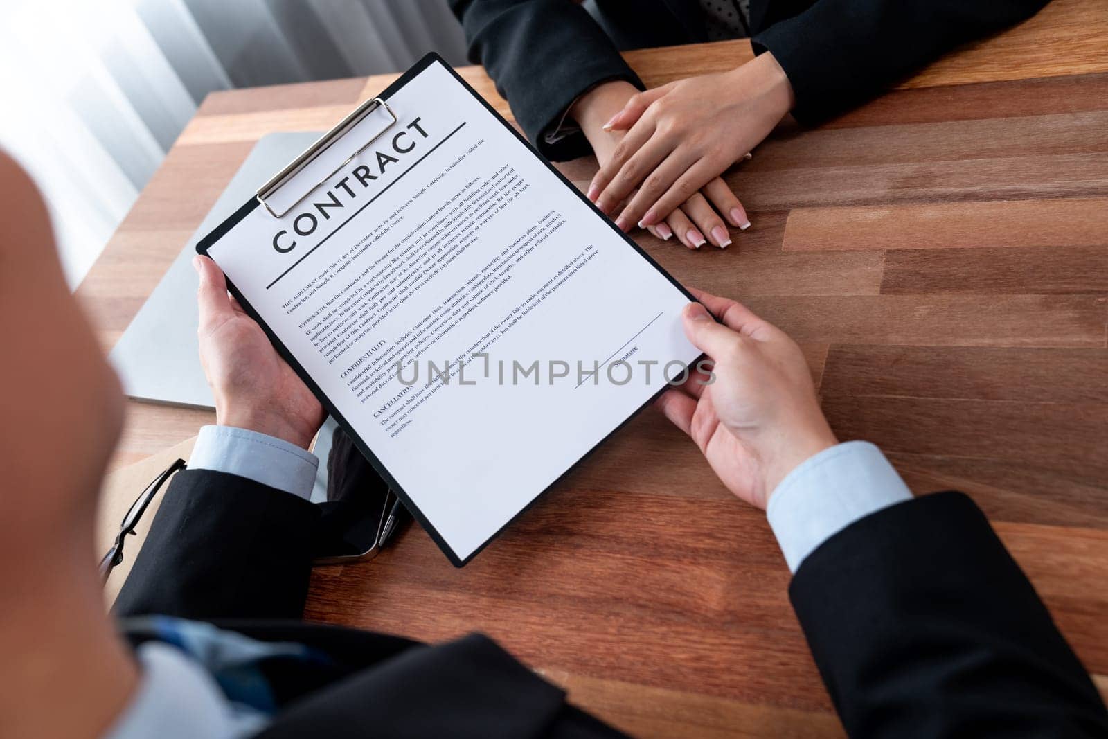 Businessman review agreement document before signing contract. Reading carefully to ensure trade deal align with business goals. Professionalism for business decision making concept. Jubilant