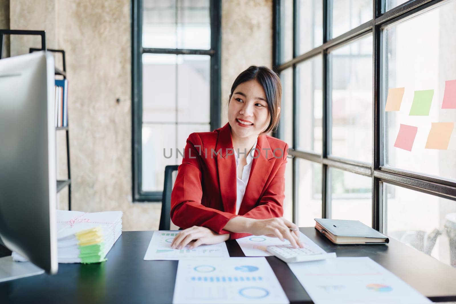 Portrait of a woman business owner showing a happy smiling face as he has successfully