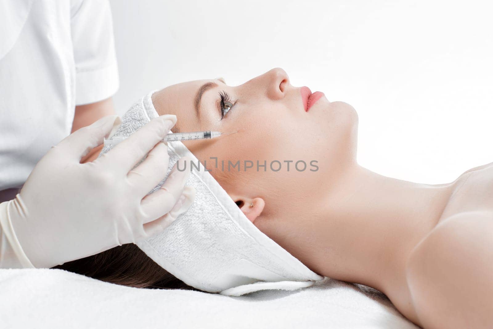 woman getting injection. beauty injections and cosmetology