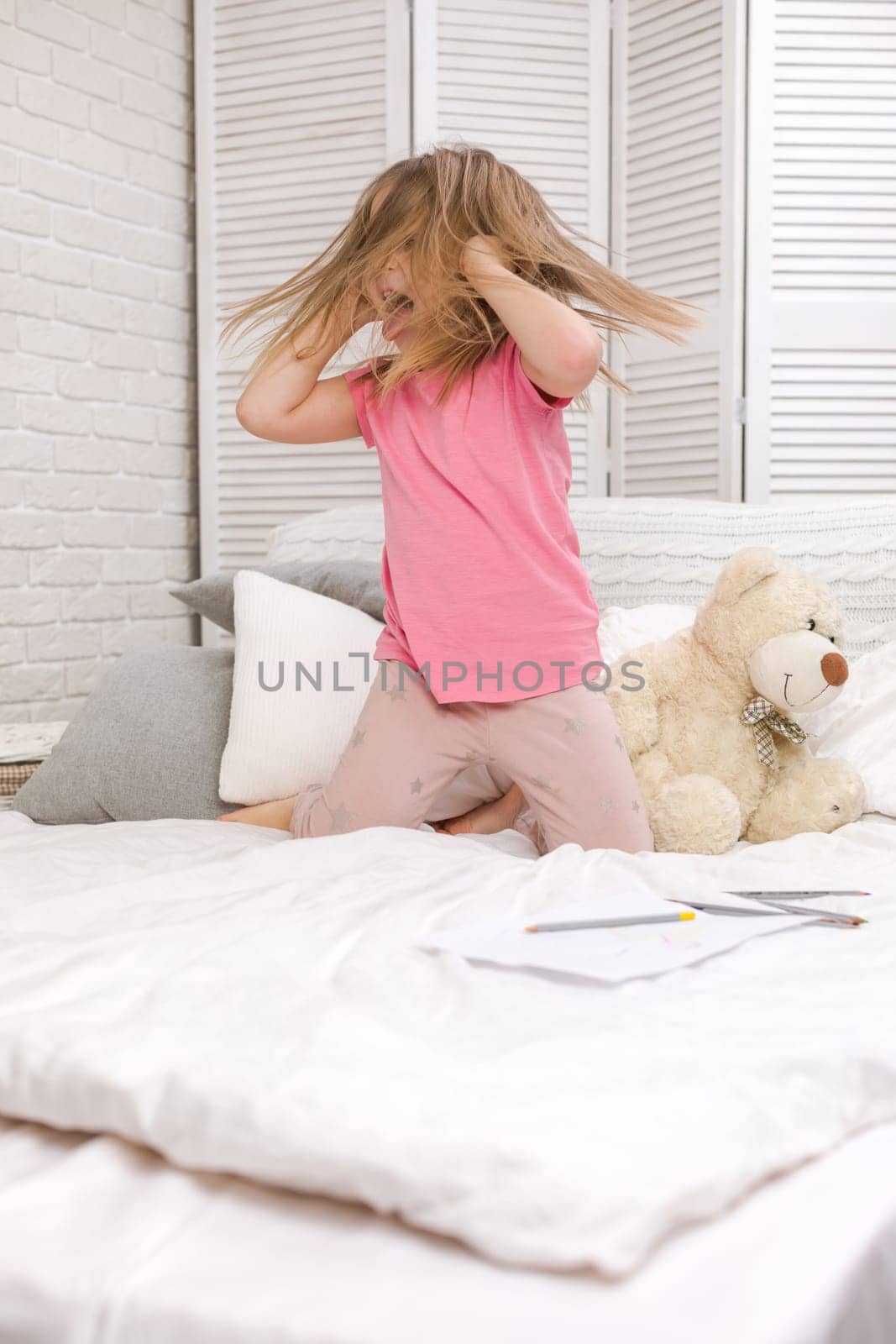 cute little child girl fooling around by erstudio