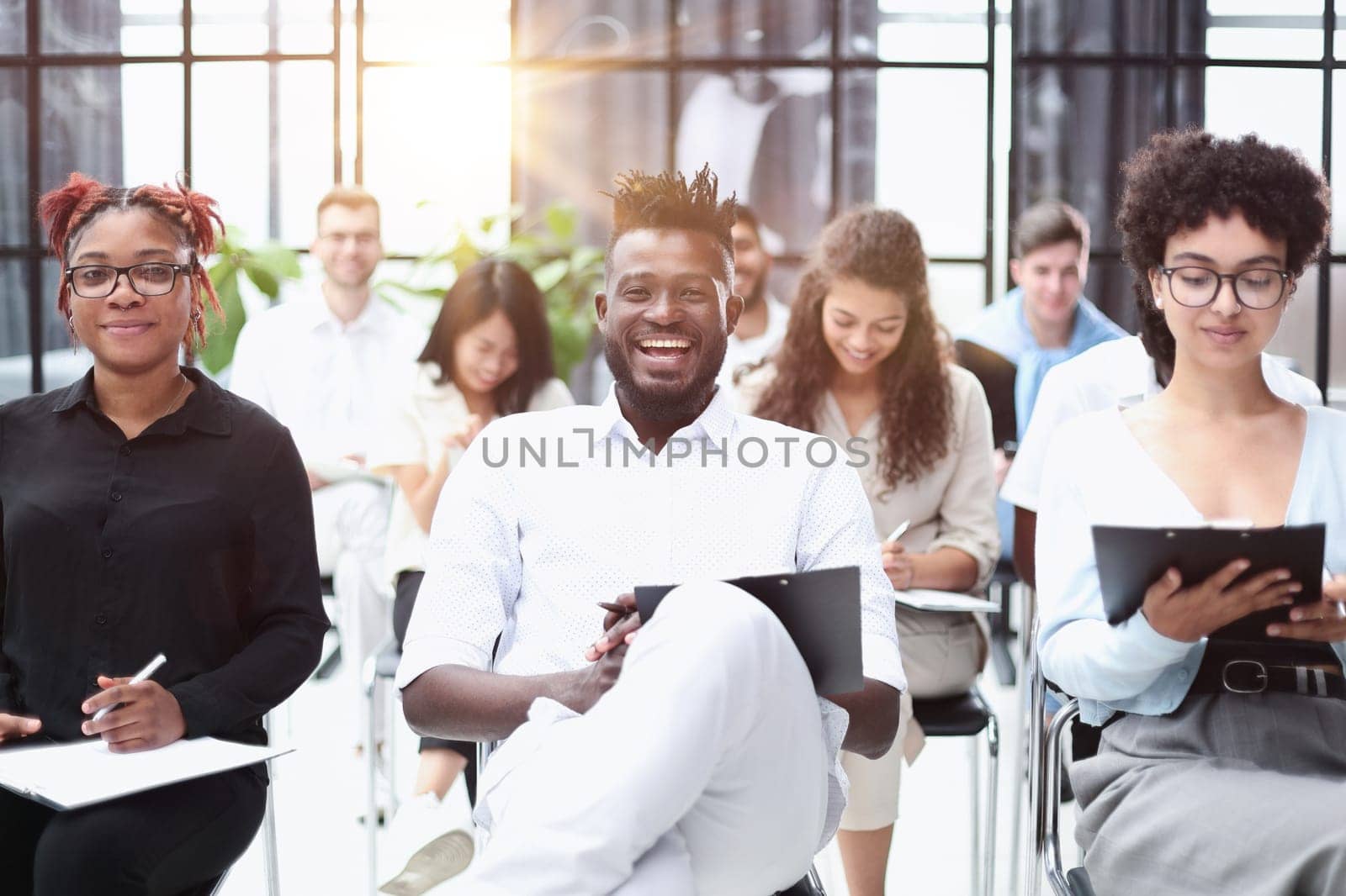 Group of multi-ethnic business people in a seminar