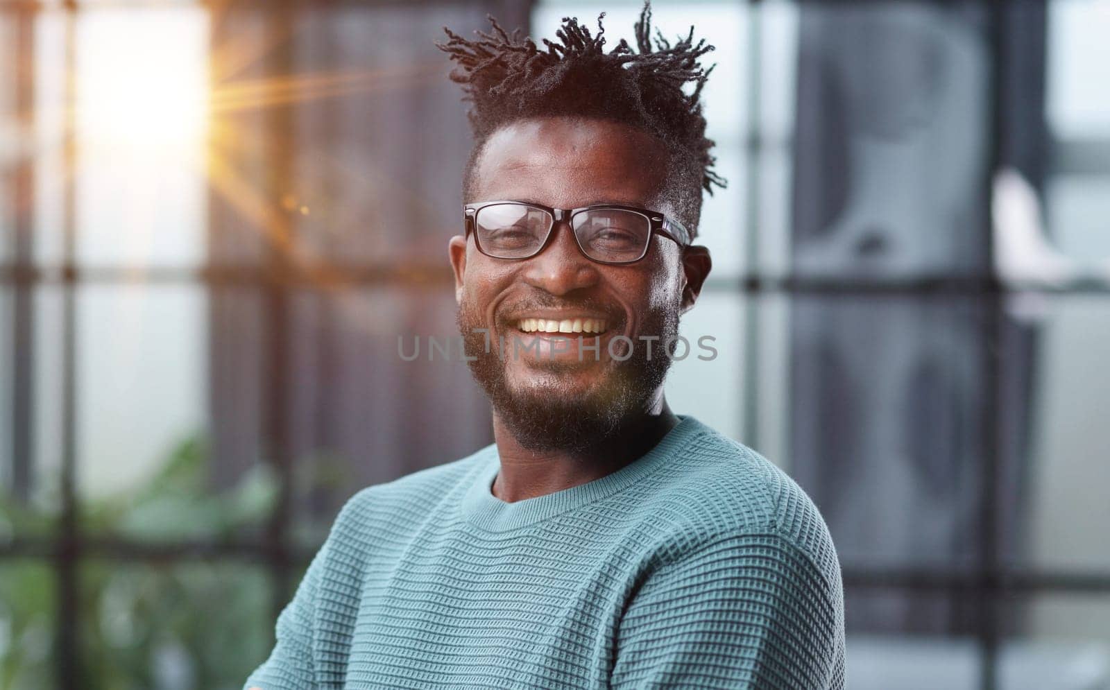 Thoughtful young black man looking straight ahead