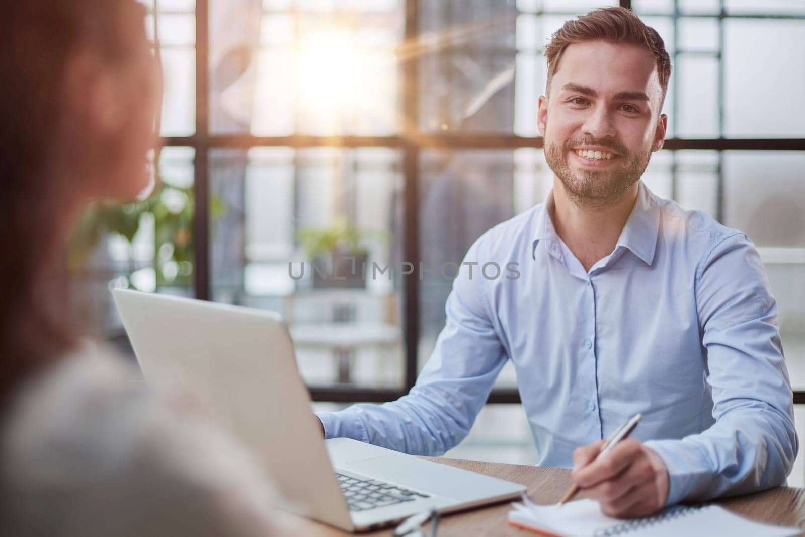 business man sitting at his desk in the office
