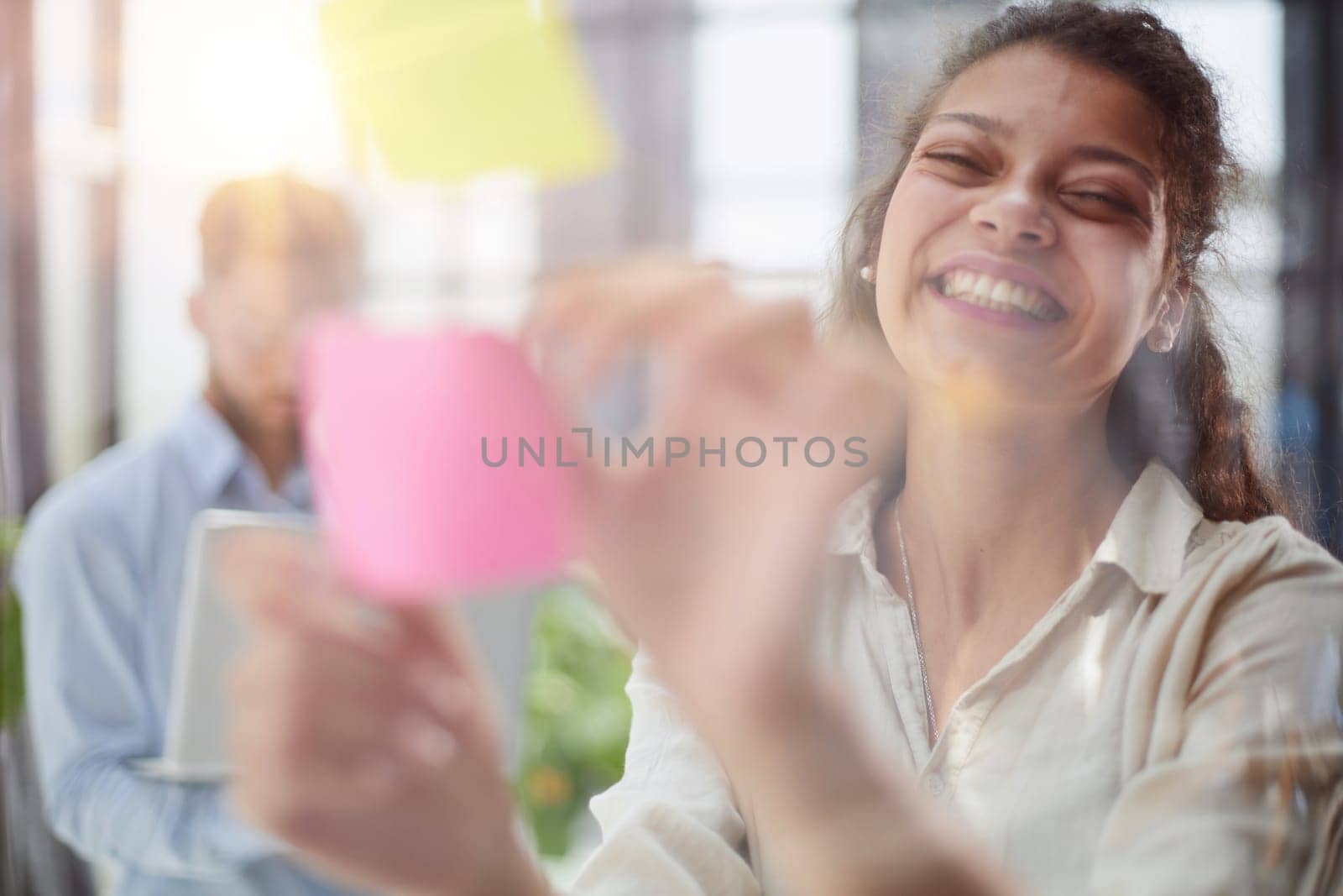 Bringing her vision to life. Shot of a confident businesswoman presenting an idea to her colleague
