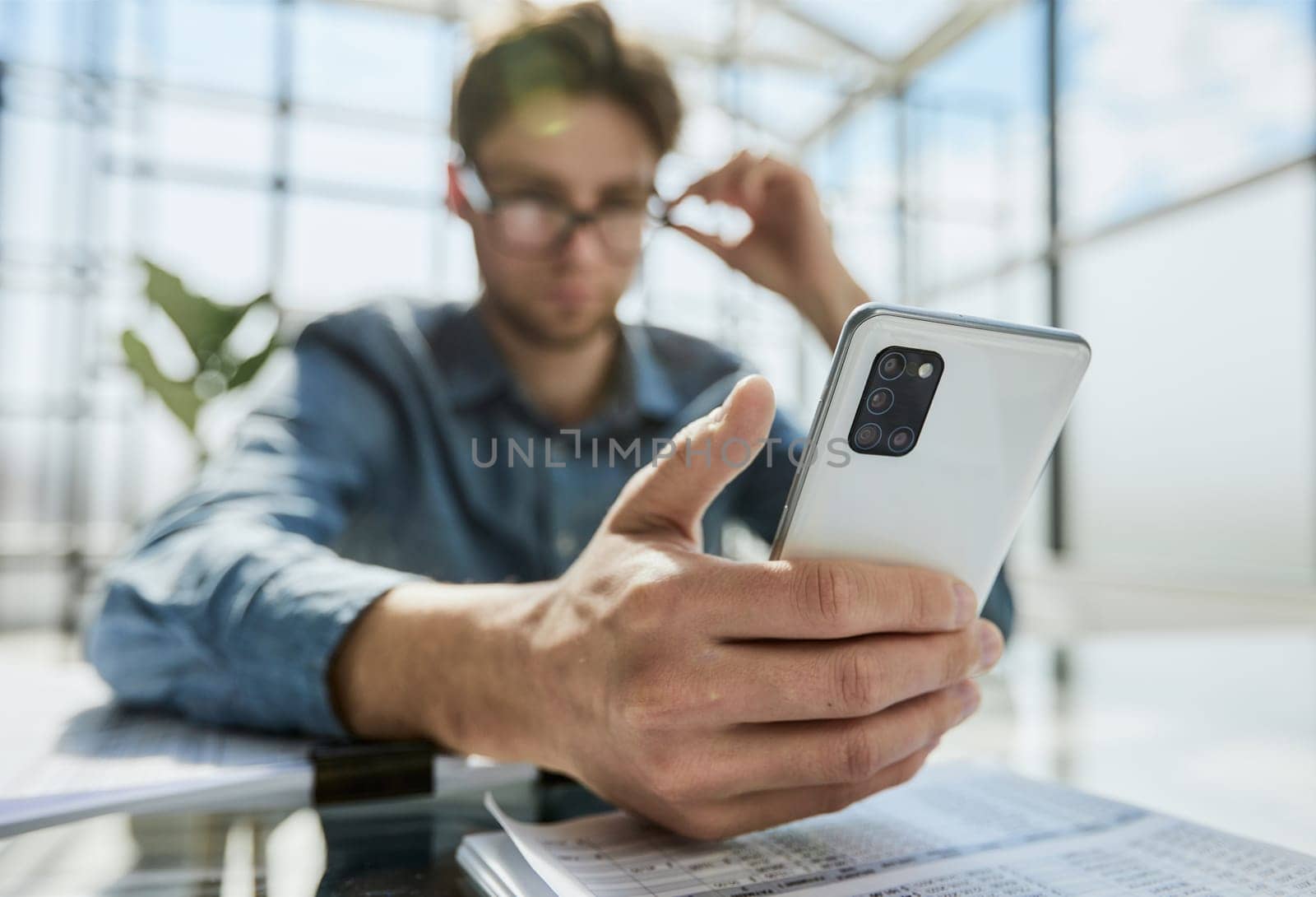 business man ceo wearing sitting in office using cell phone solutions.