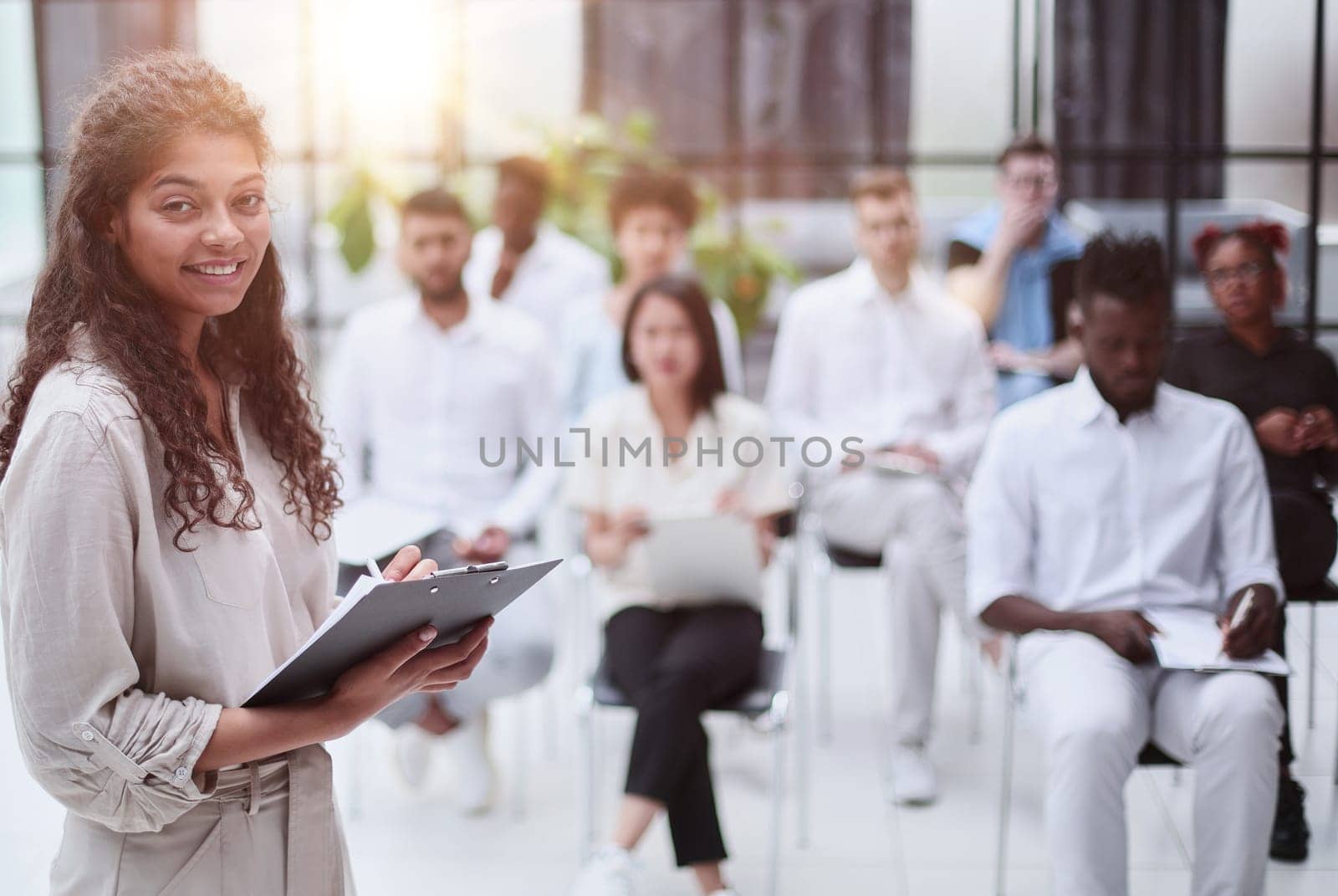 Business people attending a seminar with social distancing