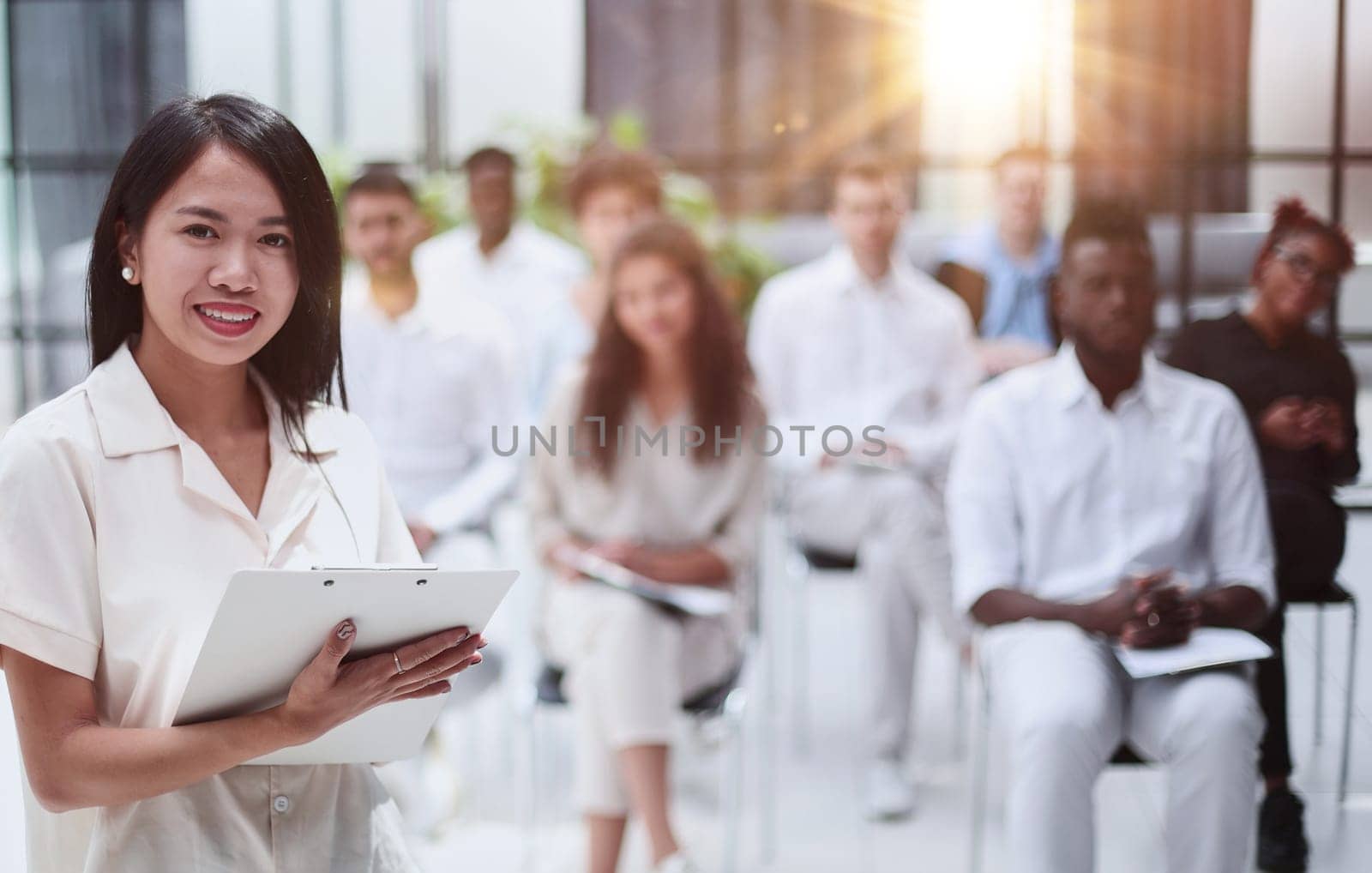 Business people attending a seminar with social distancing
