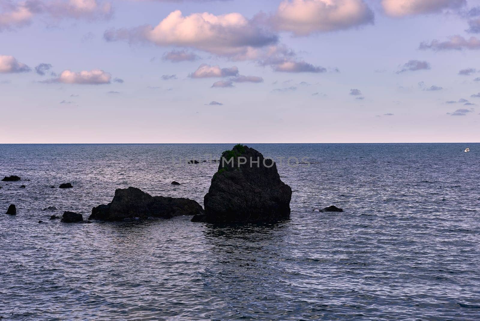 Big rocks in the ocean at low tide by raul_ruiz