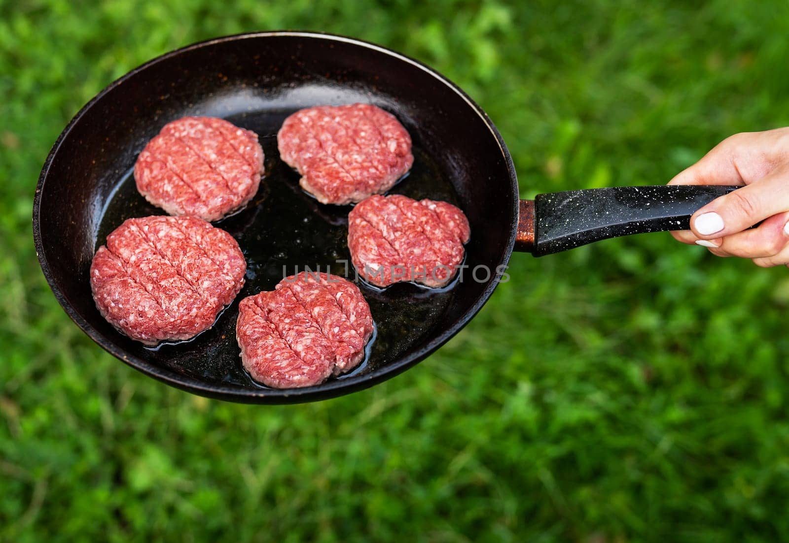 Fried patties in a pan. Rural menu. Traditional village food. Top view of the frying pan