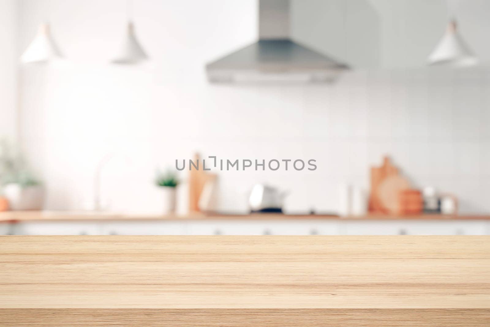 Empty beautiful wood table top counter and blur bokeh modern kitchen interior background in clean and bright,Banner, Ready for product montage.